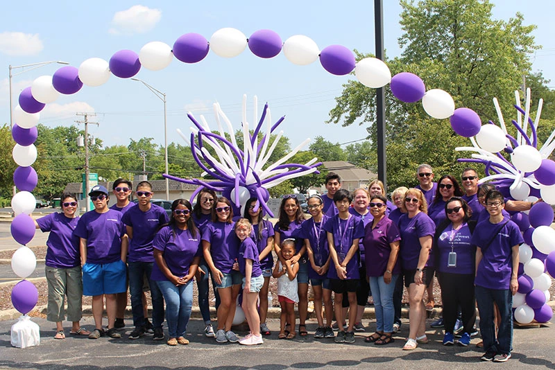 First Midwest employees and their families at a volunteer event exemplify corporate social responsibility
