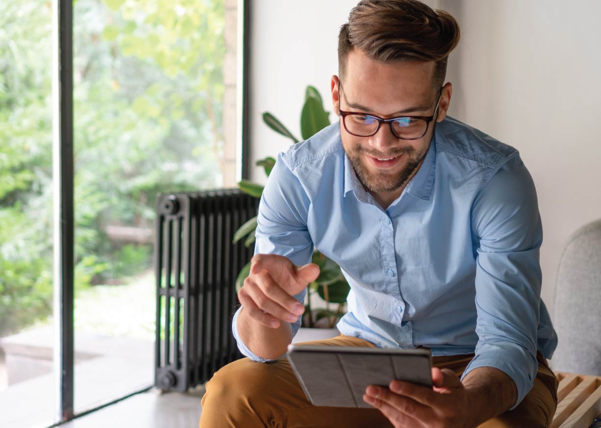 A client using the new mobile app on his tablet