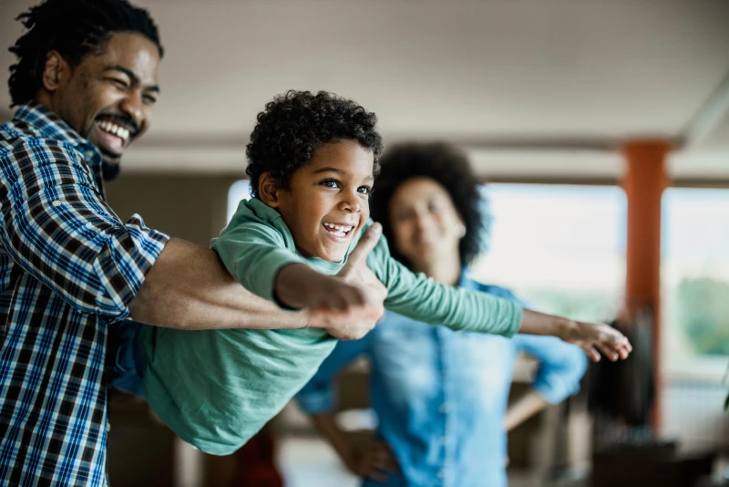 A family playing in their new home