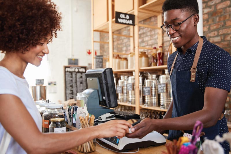 A shopper paying via Samsung Pay