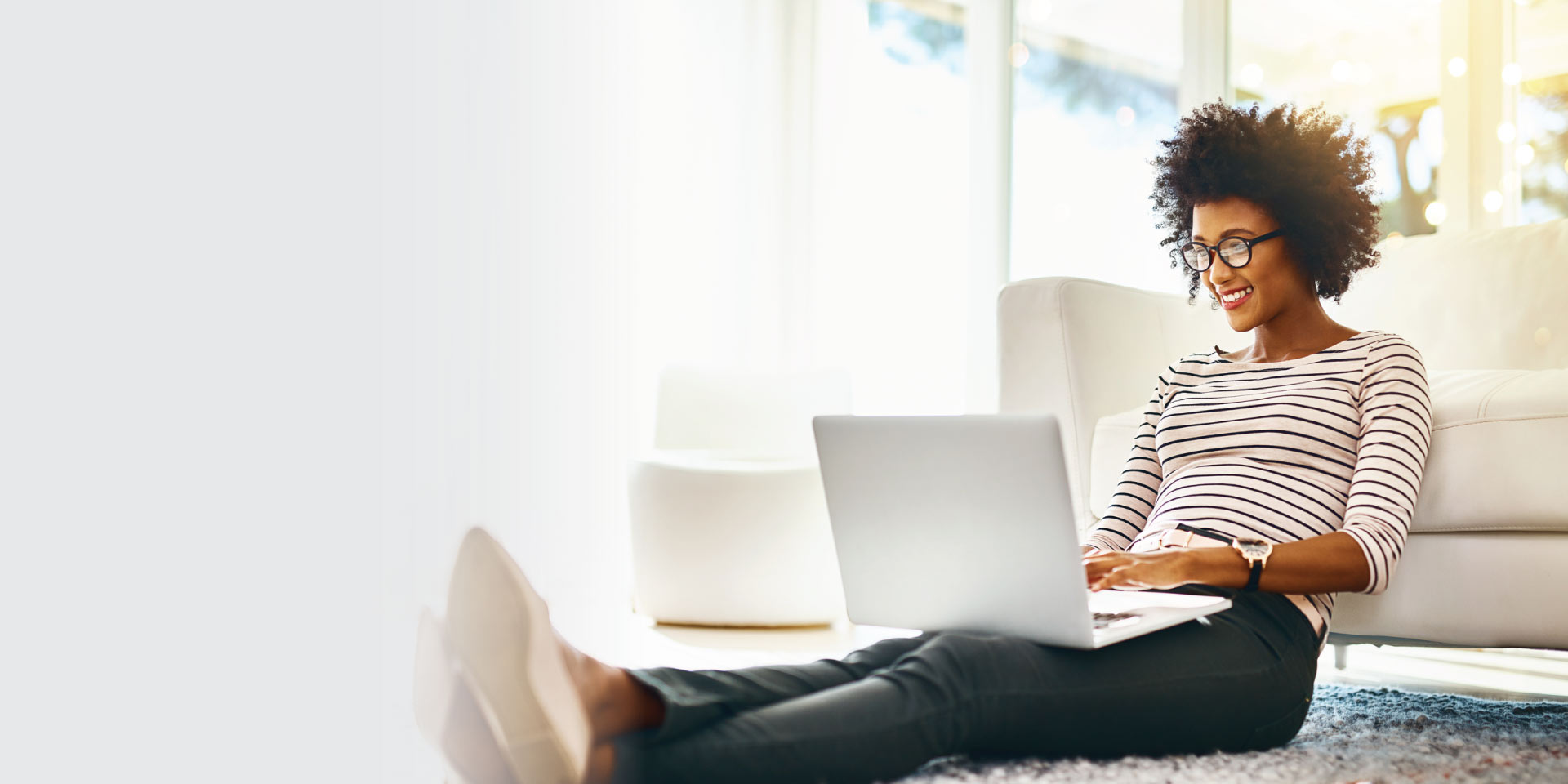 A woman enrolling in eStatements from her laptop