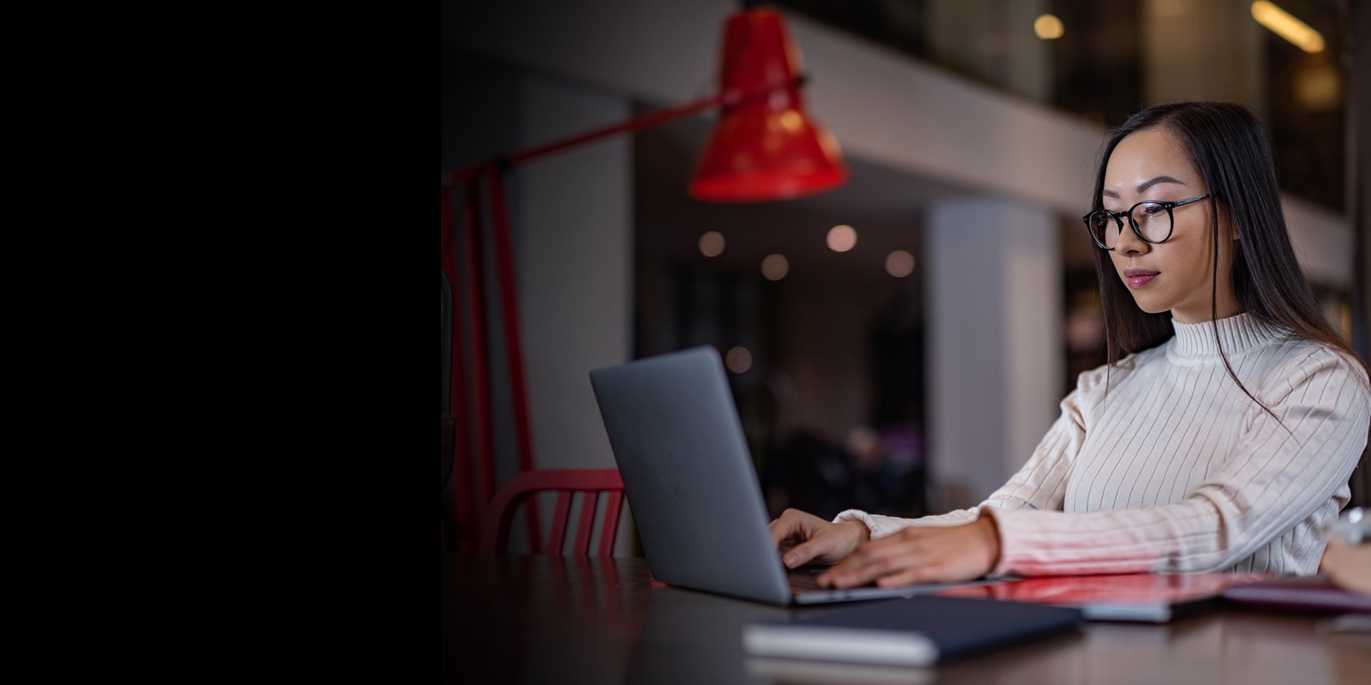 Woman typing on her computer