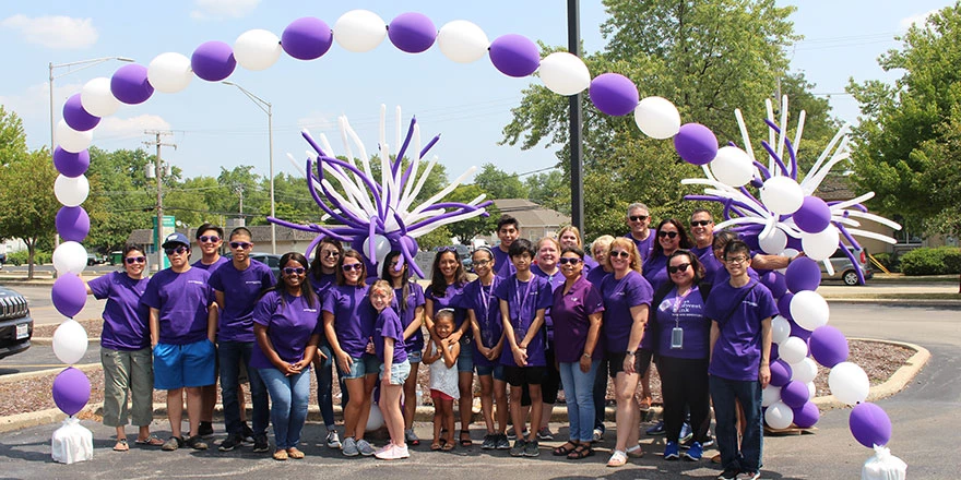 First Midwest employees and their families at a volunteer event exemplify corporate social responsibility