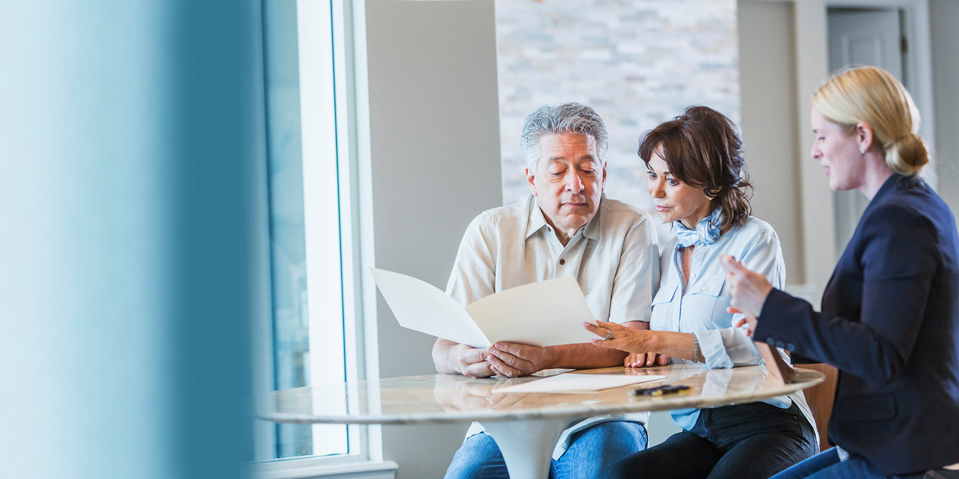 Older couple reviewing their financial caregiver options