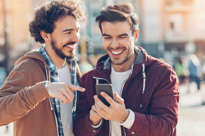 A man sending money to his friend