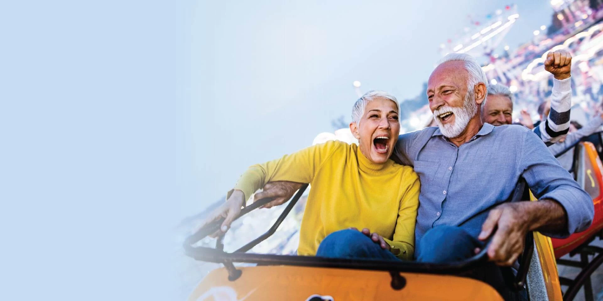 A couple riding a rollercoaster